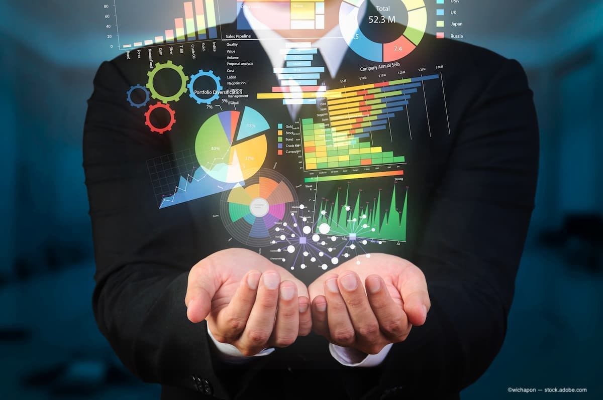 A business  woman holding a visualization of multiple data. (Image Credit: AdobeStock/wichapon)
