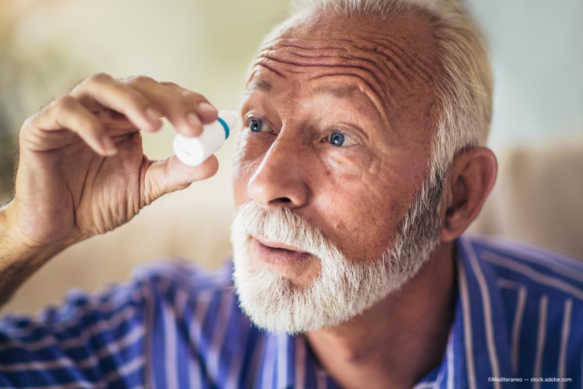 An older man applying eye drops to one eye. (Image Credit: AdobeStock/Mediteraneo)