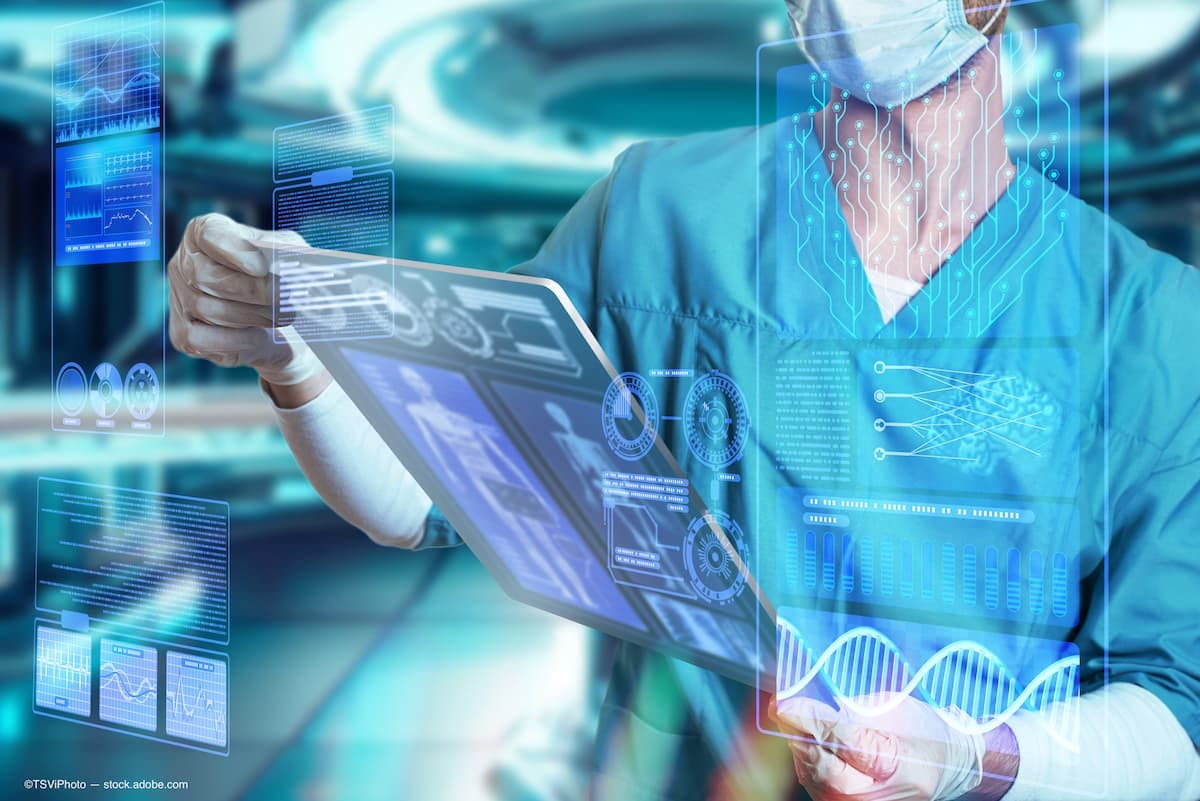 A doctor with augmented data surrounding him. (Image Credit: AdobeStock/TSViPhoto)