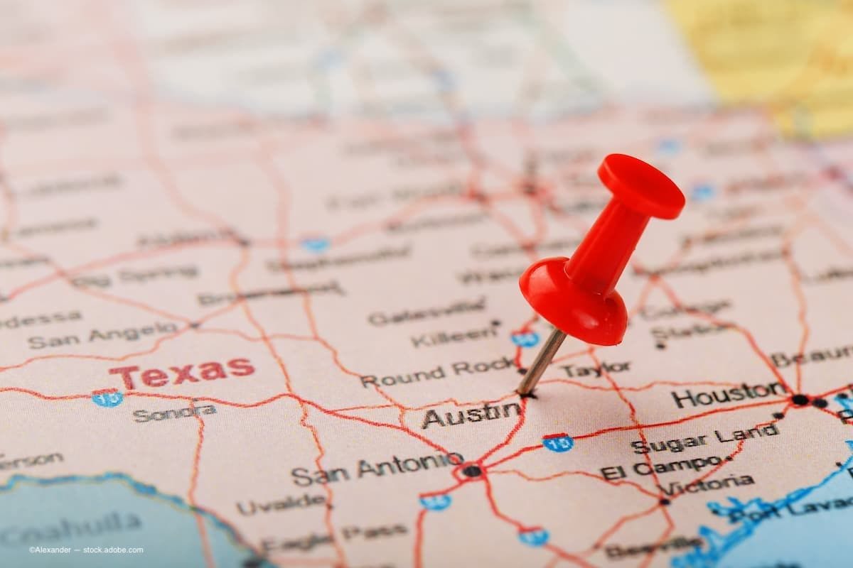 a map of Texas with a red pin on Austin (Image Credit: AdobeStock/Alexander)