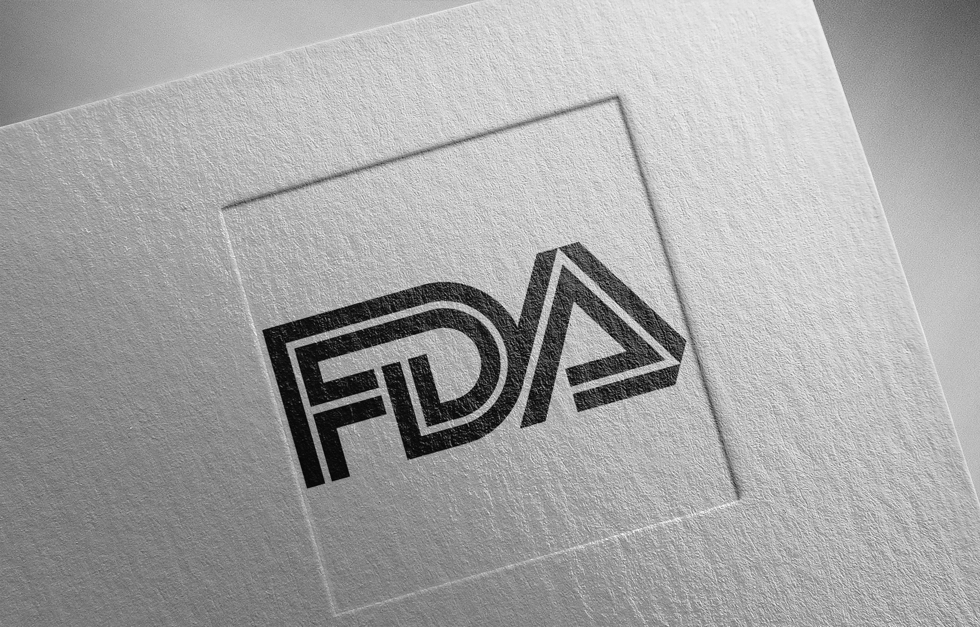 an image of the FDA logo on a grey background.