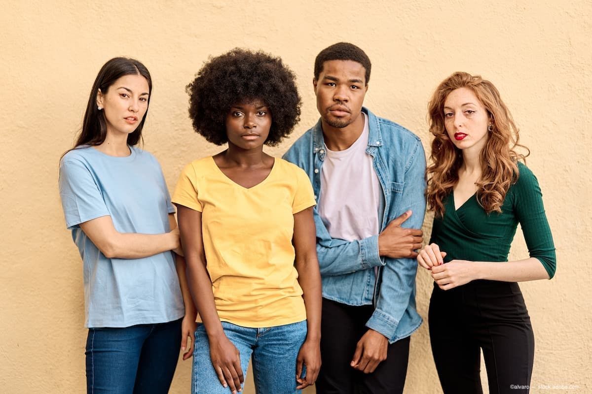 A group of 4 multiracial people. (Image Credit: AdobeStock/alvaro)
