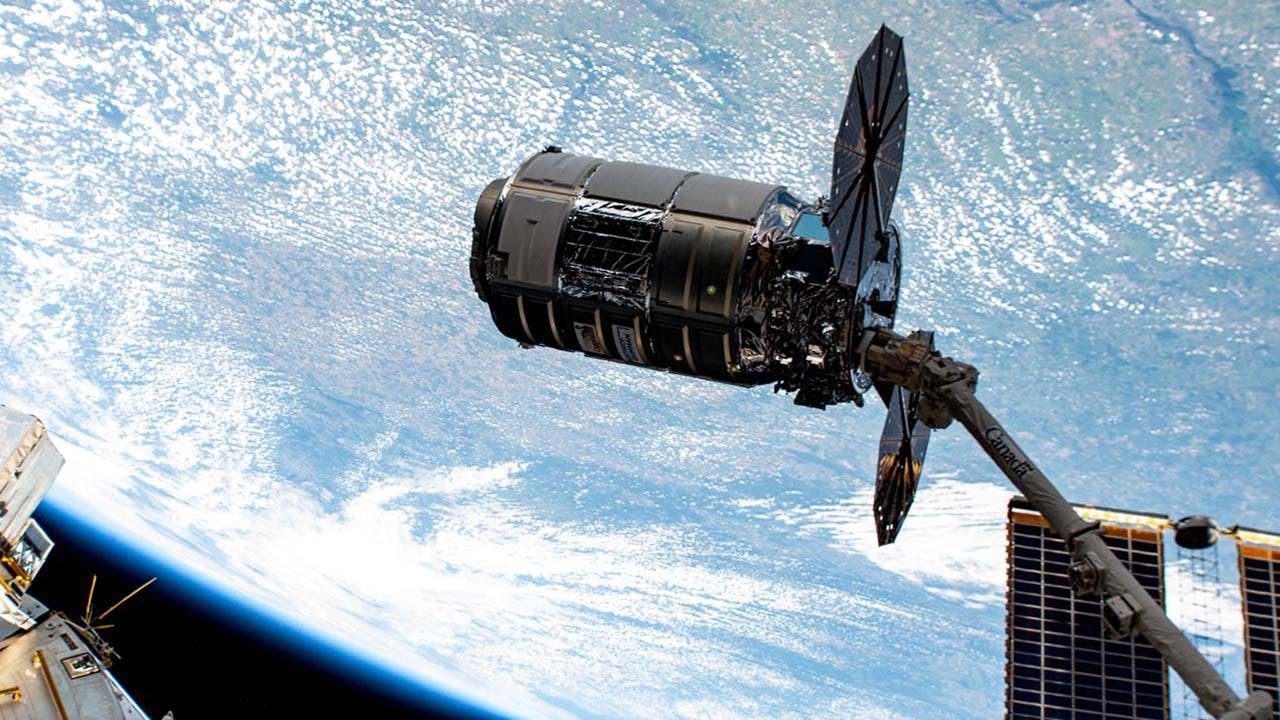 Northrop Grumman's Cygnus cargo craft is pictured after being captured by the Canadarm2 robotic arm on the International Space Station in August 2023. (Image credit: NASA)