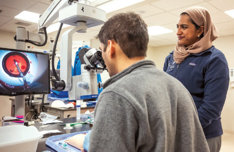 Shameema Sikder, at right, oversees surgical training conducted at the Center of Excellence for Ophthalmic Surgical Education and Training. (Image credit: Wilmer Eye Institute)