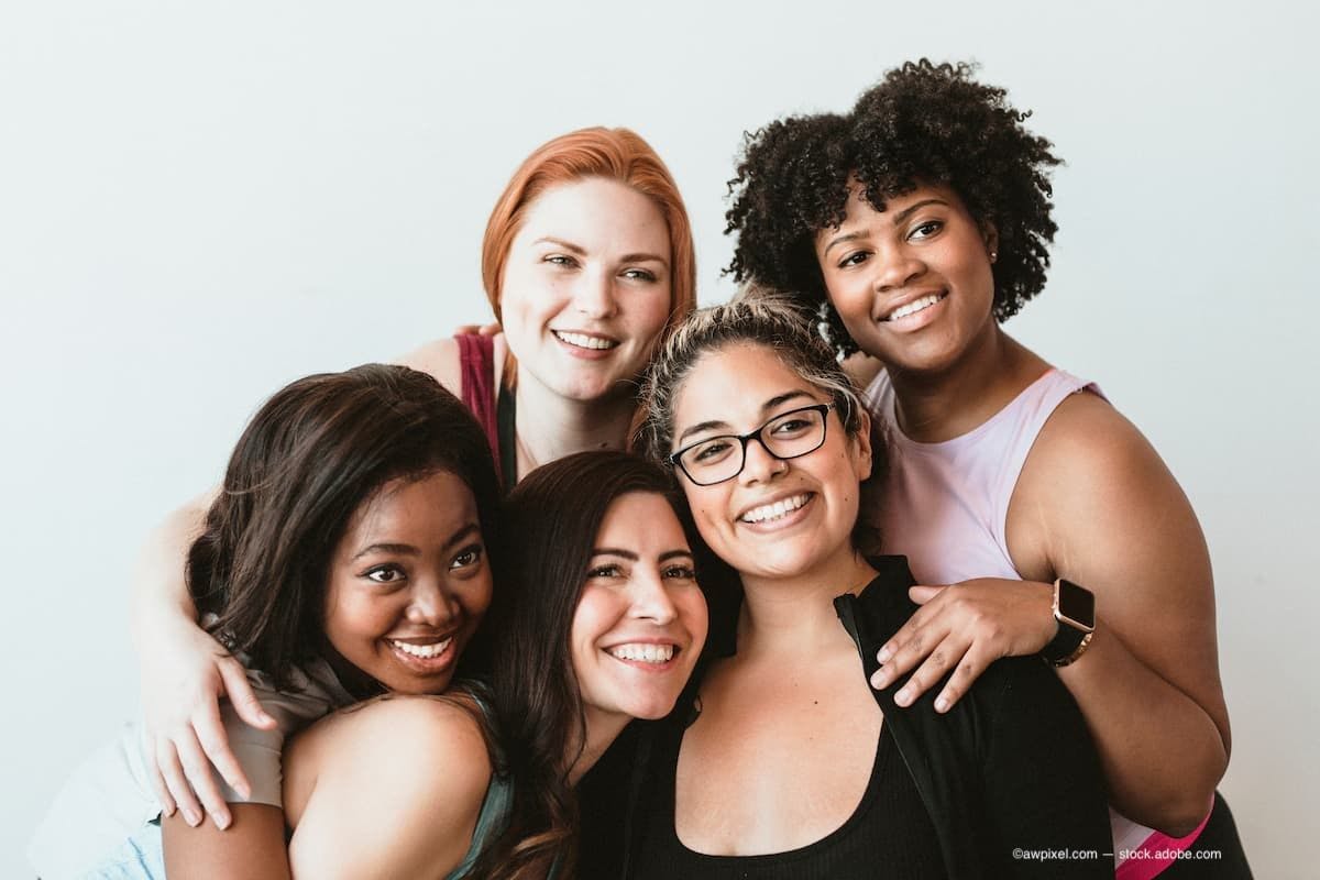 a group of women laughing and smiling (Image Credit: AdobeStock/awpixel.com)