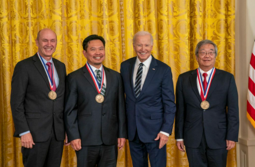 President Joe Biden presented OHSU ophthalmologist David Huang, MD, PhD, (second from left) and 2 others with the National Medal of Technology and Innovation for developing the imaging technology optical coherence tomography at a White House ceremony on October 24, 2023. Eric A. Swanson, MS, far left, and James G. Fujimoto, PhD, far right, were also recognized. (Image courtesy of Ryan K. Morris and the National Science and Technology Medals Foundation)
